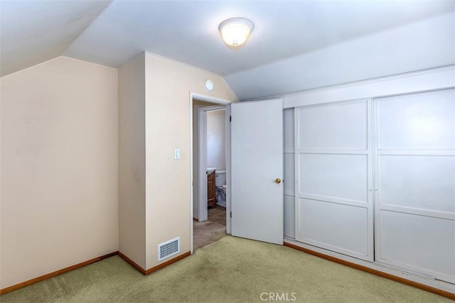 14836 Rayfield Dr, La Mirada, CA 90638 - unfurnished bedroom with vaulted ceiling and carpet flooring