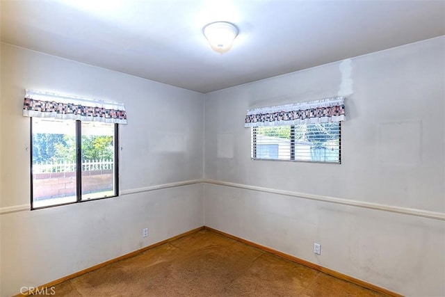 14836 Rayfield Dr, La Mirada, CA 90638 - carpeted empty room featuring baseboards