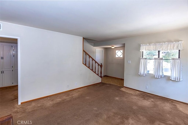 14836 Rayfield Dr, La Mirada, CA 90638 - unfurnished living room featuring carpet flooring and stairway