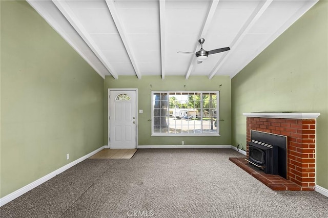 2344 Porter Way, Chico, CA 95926 - unfurnished living room with a wood stove, a ceiling fan, and carpet