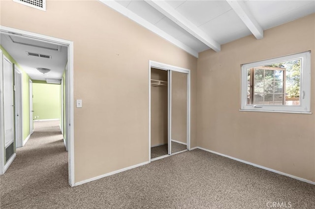2344 Porter Way, Chico, CA 95926 - unfurnished bedroom with carpet flooring, beam ceiling, and a closet
