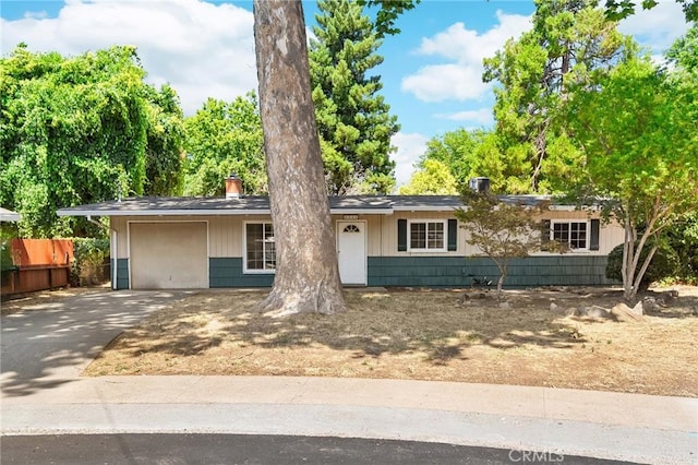 2344 Porter Way, Chico, CA 95926 - ranch-style house featuring concrete driveway and a chimney