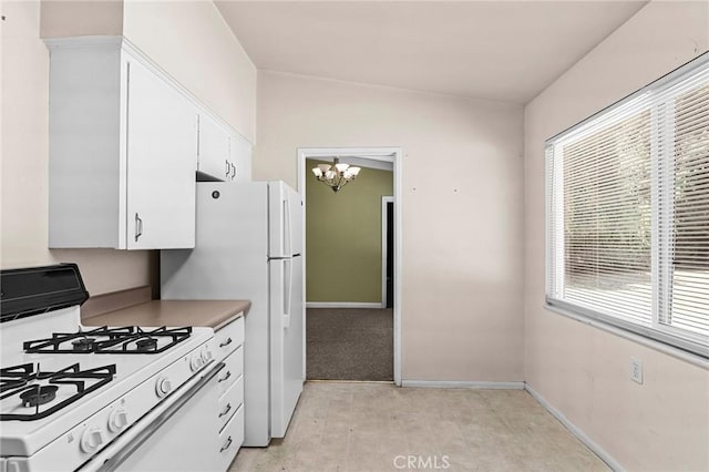 2344 Porter Way, Chico, CA 95926 - kitchen featuring white appliances, a chandelier, white cabinets, and light countertops