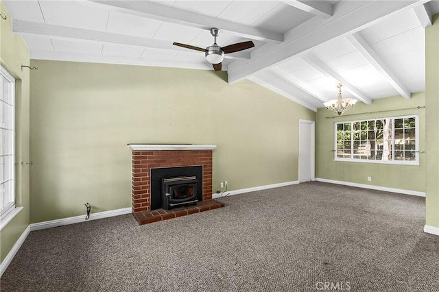 2344 Porter Way, Chico, CA 95926 - unfurnished living room featuring a wood stove, carpet, a chandelier, and ceiling fan