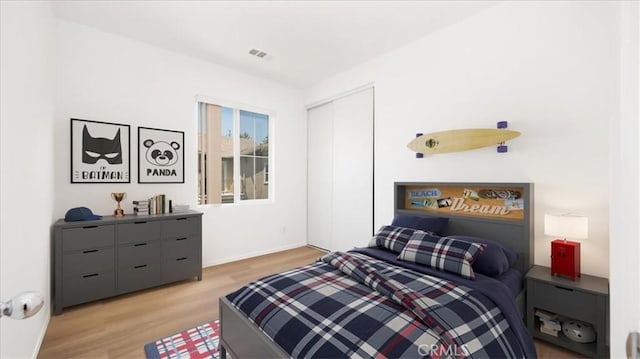 10375 Church St Unit 74, Rancho Cucamonga, CA 91730 - bedroom featuring light wood-style floors and a closet