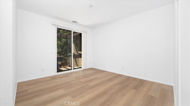 10375 Church St Unit 74, Rancho Cucamonga, CA 91730 - unfurnished room featuring wood finished floors and baseboards