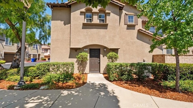 10375 Church St Unit 74, Rancho Cucamonga, CA 91730 - view of front of property with stucco siding