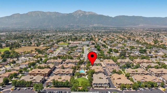 10375 Church St Unit 74, Rancho Cucamonga, CA 91730 - aerial view of property's location featuring a mountain backdrop and nearby suburban area