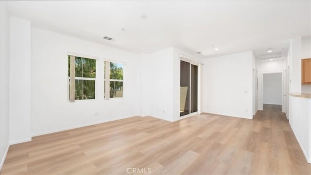 10375 Church St Unit 74, Rancho Cucamonga, CA 91730 - empty room with light wood finished floors and recessed lighting