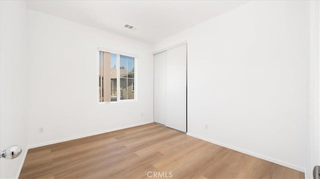 10375 Church St Unit 74, Rancho Cucamonga, CA 91730 - empty room featuring light wood-style floors and baseboards