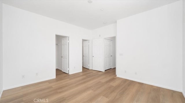 10375 Church St Unit 74, Rancho Cucamonga, CA 91730 - unfurnished bedroom featuring light wood-type flooring and baseboards