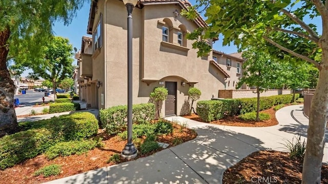 10375 Church St Unit 74, Rancho Cucamonga, CA 91730 - view of front facade with stucco siding