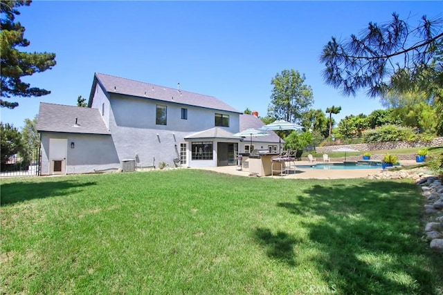 17321 Sunset View Dr, Riverside, CA 92504 - back of house featuring stucco siding, a patio area, and a sunroom
