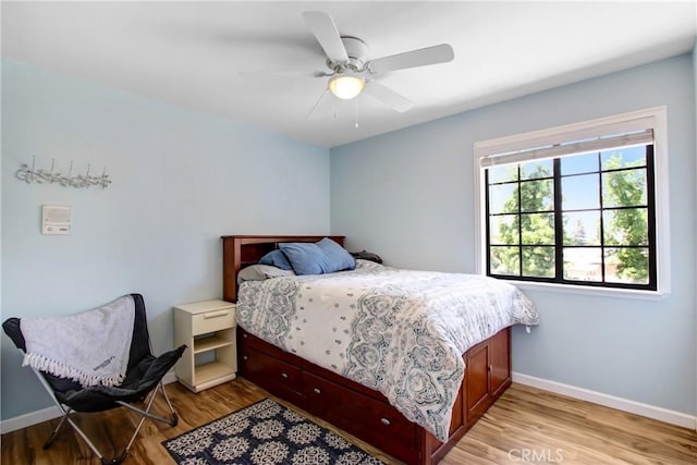 17321 Sunset View Dr, Riverside, CA 92504 - bedroom with light wood-type flooring and a ceiling fan
