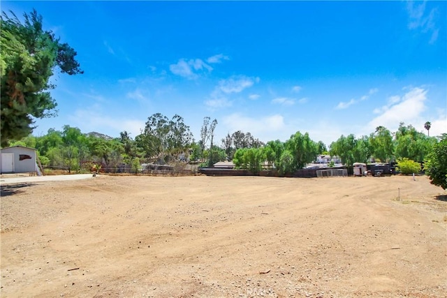 17321 Sunset View Dr, Riverside, CA 92504 - view of yard with a storage unit