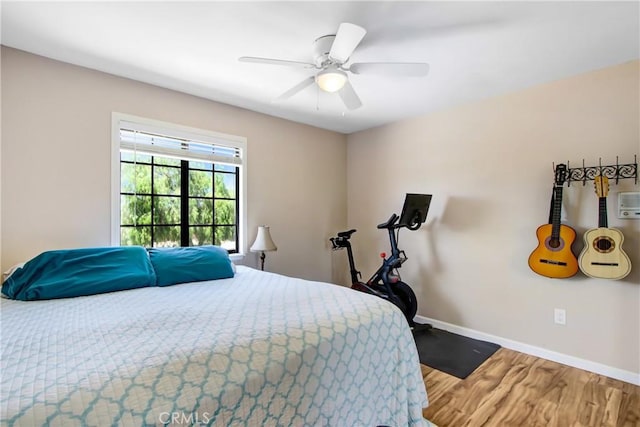 17321 Sunset View Dr, Riverside, CA 92504 - bedroom with wood finished floors and a ceiling fan