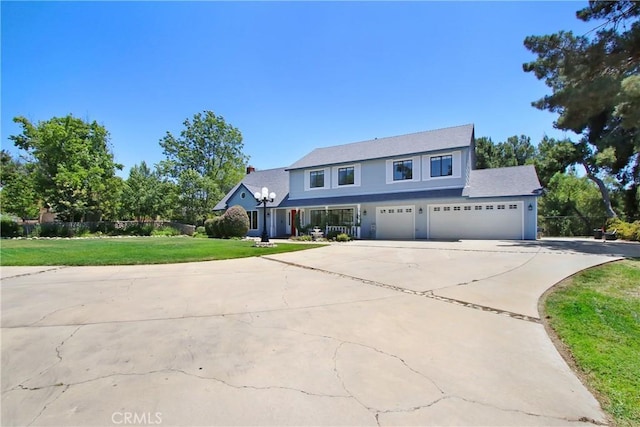 17321 Sunset View Dr, Riverside, CA 92504 - traditional home with driveway, a front lawn, and a garage