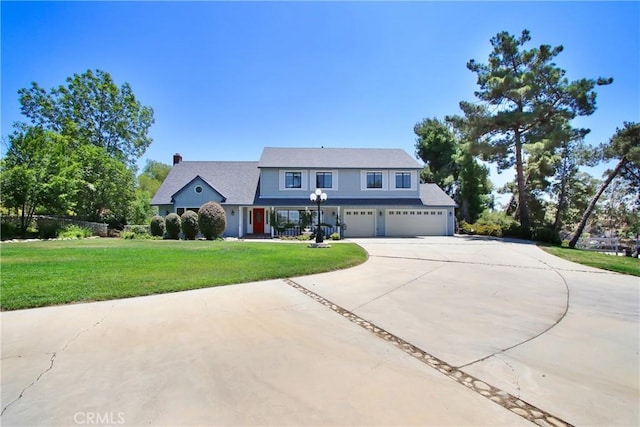 17321 Sunset View Dr, Riverside, CA 92504 - traditional-style home featuring a garage, concrete driveway, a front lawn, and a chimney