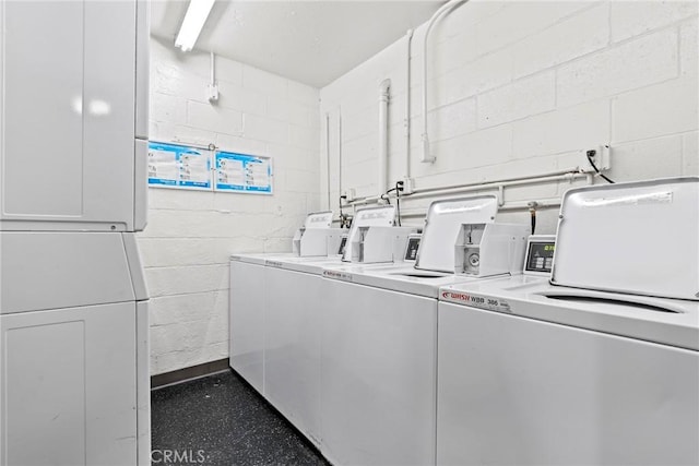 6542 Ocean Crest Dr Unit B208, Rancho Palos Verdes, CA 90275 - shared laundry room with washing machine and clothes dryer and concrete block wall