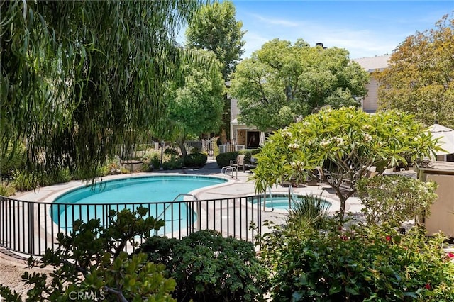 7038 De Celis Pl Unit 4, Van Nuys, CA 91406 - community pool featuring a patio area