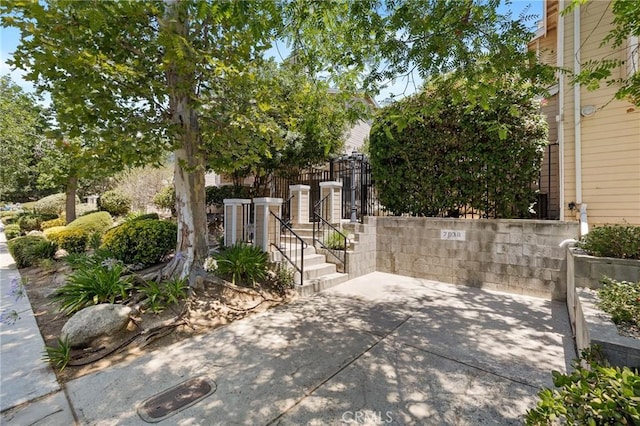 7038 De Celis Pl Unit 4, Van Nuys, CA 91406 - gate featuring a patio