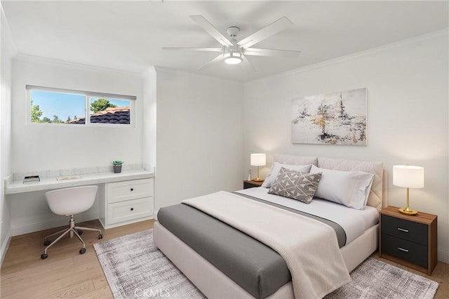 19022 Shamrock Ln, Yorba Linda, CA 92886 - bedroom with built in study area, crown molding, light wood-type flooring, and ceiling fan