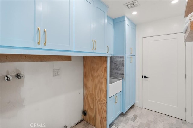 19022 Shamrock Ln, Yorba Linda, CA 92886 - laundry area with recessed lighting and cabinet space