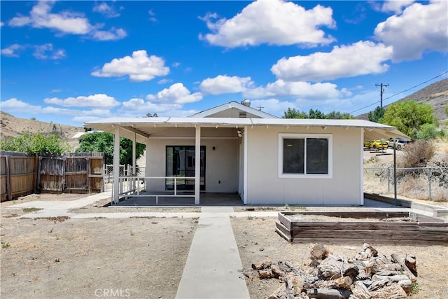 28296 Oregon Pl, Menifee, CA 92587 - back of property featuring stucco siding and a patio area