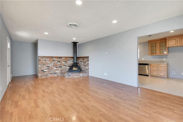 28296 Oregon Pl, Menifee, CA 92587 - unfurnished living room featuring light wood finished floors and recessed lighting