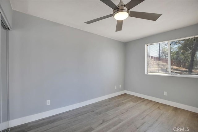 28296 Oregon Pl, Menifee, CA 92587 - unfurnished room with wood finished floors and a ceiling fan
