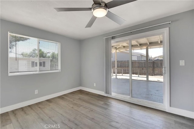 28296 Oregon Pl, Menifee, CA 92587 - unfurnished room featuring wood finished floors and a ceiling fan