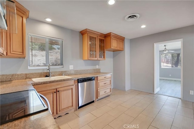 28296 Oregon Pl, Menifee, CA 92587 - kitchen with dishwasher, range, light countertops, glass insert cabinets, and recessed lighting