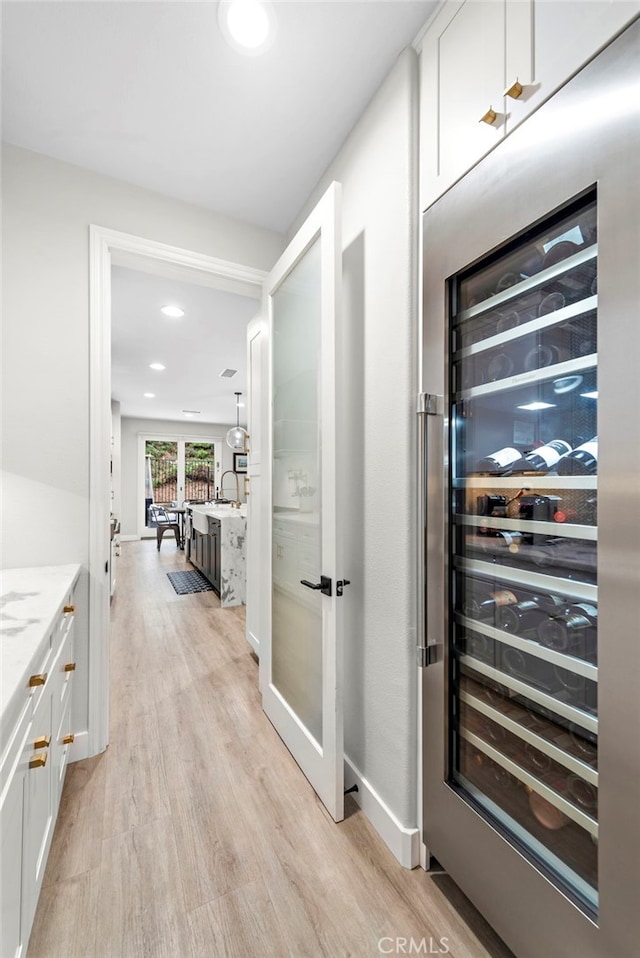 20 Becker, Ladera Ranch, CA 92694 - wine area with wine cooler, light wood-style flooring, and recessed lighting