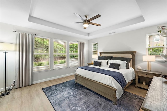 20 Becker, Ladera Ranch, CA 92694 - bedroom with a tray ceiling, wood finished floors, and ceiling fan