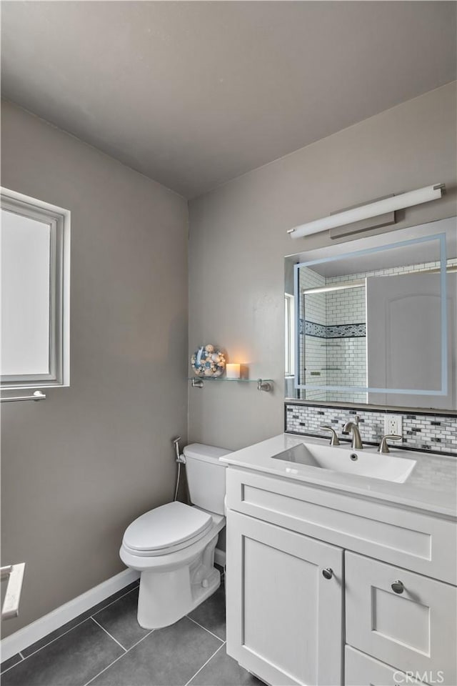 284 Chiquita St, Laguna Beach, CA 92651 - full bath with tile patterned flooring, vanity, a tile shower, and decorative backsplash