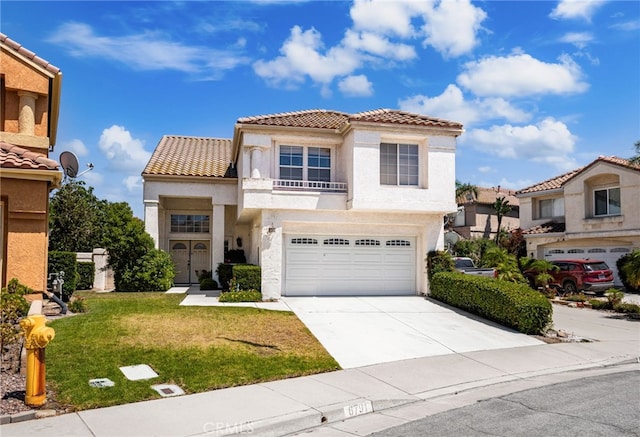 6791 Florence Pl, Rancho Cucamonga, CA 91701 - mediterranean / spanish house with a tile roof, concrete driveway, a garage, and stucco siding