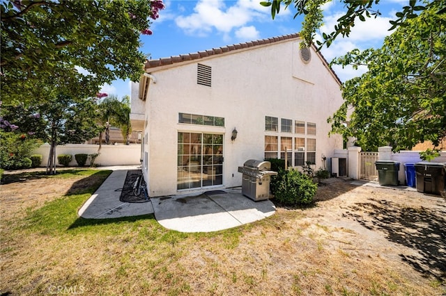 6791 Florence Pl, Rancho Cucamonga, CA 91701 - rear view of property featuring stucco siding, a patio, and a tiled roof