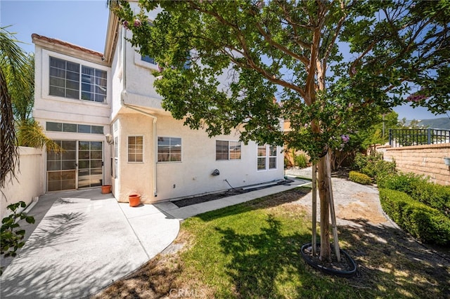 6791 Florence Pl, Rancho Cucamonga, CA 91701 - back of house with stucco siding and a patio area