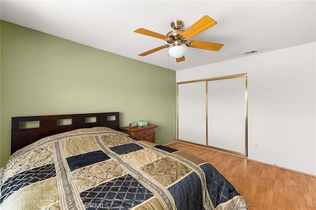 6791 Florence Pl, Rancho Cucamonga, CA 91701 - bedroom featuring wood finished floors, ceiling fan, and a closet