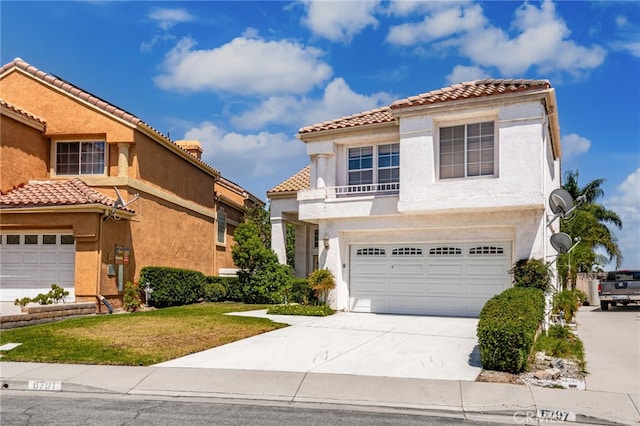 6791 Florence Pl, Rancho Cucamonga, CA 91701 - mediterranean / spanish home with stucco siding, a garage, driveway, a tiled roof, and a front yard