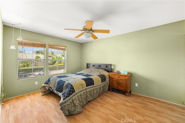 6791 Florence Pl, Rancho Cucamonga, CA 91701 - bedroom with wood finished floors and ceiling fan