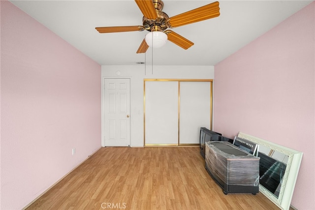 6791 Florence Pl, Rancho Cucamonga, CA 91701 - bedroom featuring light wood-style floors, a closet, and a ceiling fan