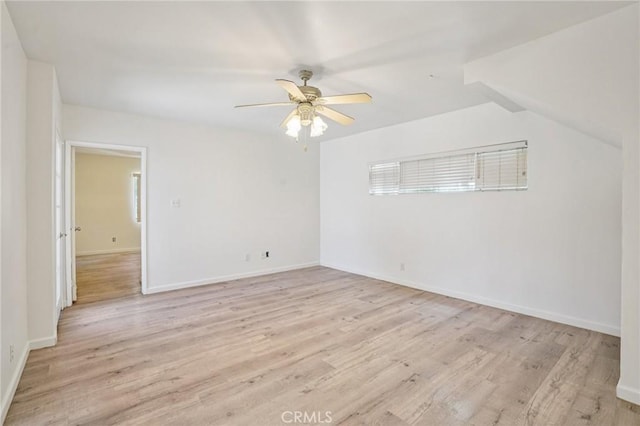 10018 San Vincente Ave, South Gate, CA 90280 - empty room featuring light wood-type flooring and ceiling fan