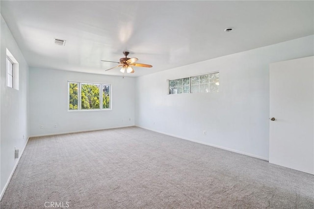10018 San Vincente Ave, South Gate, CA 90280 - empty room with carpet and ceiling fan