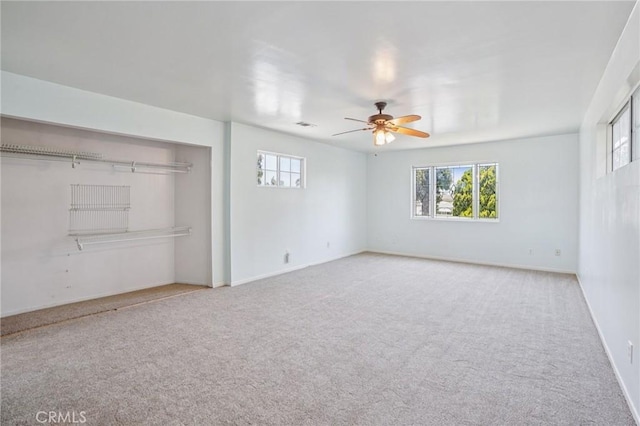 10018 San Vincente Ave, South Gate, CA 90280 - carpeted spare room with plenty of natural light and ceiling fan