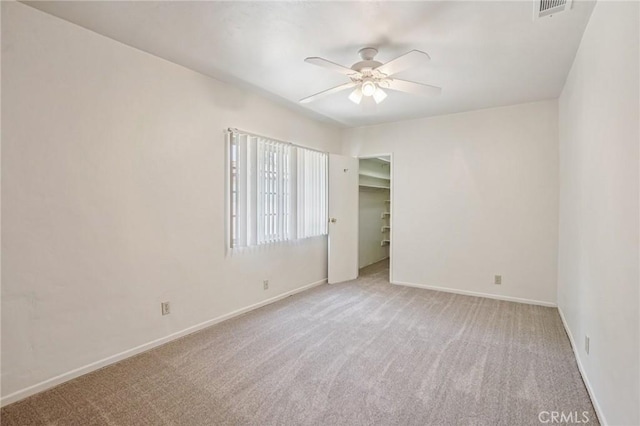 10018 San Vincente Ave, South Gate, CA 90280 - carpeted empty room featuring a ceiling fan and baseboards