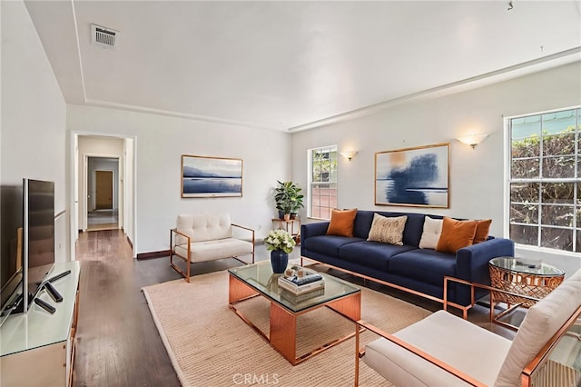 10018 San Vincente Ave, South Gate, CA 90280 - living area featuring healthy amount of natural light and wood finished floors