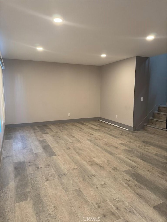 7445 Laurelgrove Ave Unit 2, North Hollywood, CA 91605 - finished basement featuring wood finished floors, stairway, and recessed lighting