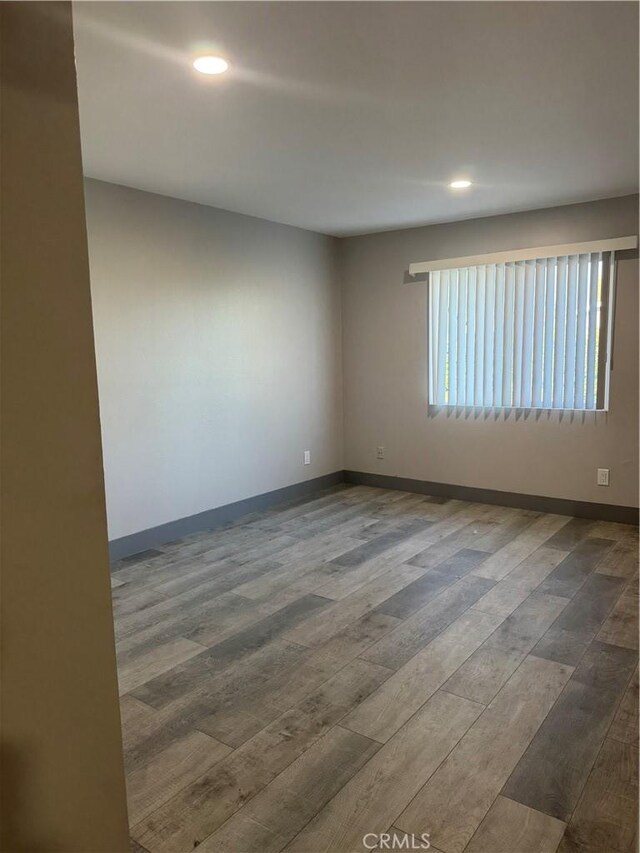 7445 Laurelgrove Ave Unit 2, North Hollywood, CA 91605 - empty room featuring wood finished floors and recessed lighting