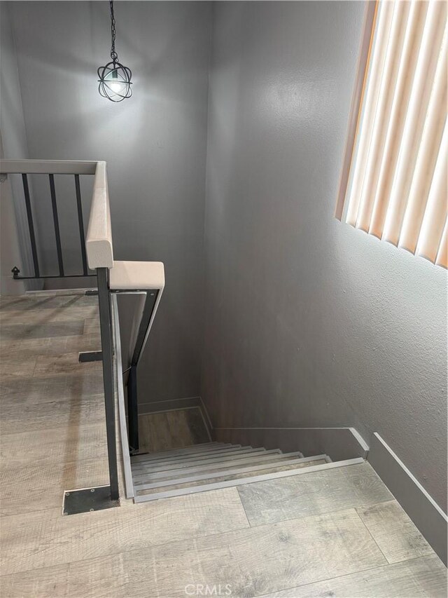7445 Laurelgrove Ave Unit 2, North Hollywood, CA 91605 - stairs featuring baseboards